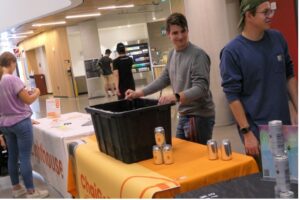Student vendors set up their booth at the EWeek launch party.