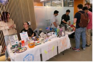 Student vendors set up their booths at the EWeek launch party.