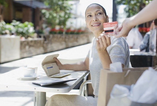 WalletHub asked Professor Karen Xie about no foreign transaction fee credit cards