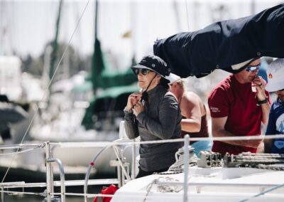 man in black hat on a sail boat