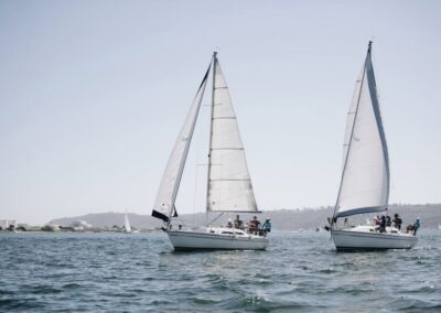 two sailboats in the water