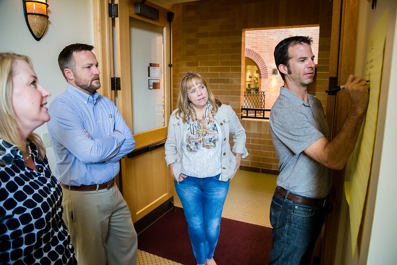 Three people discussing Insights