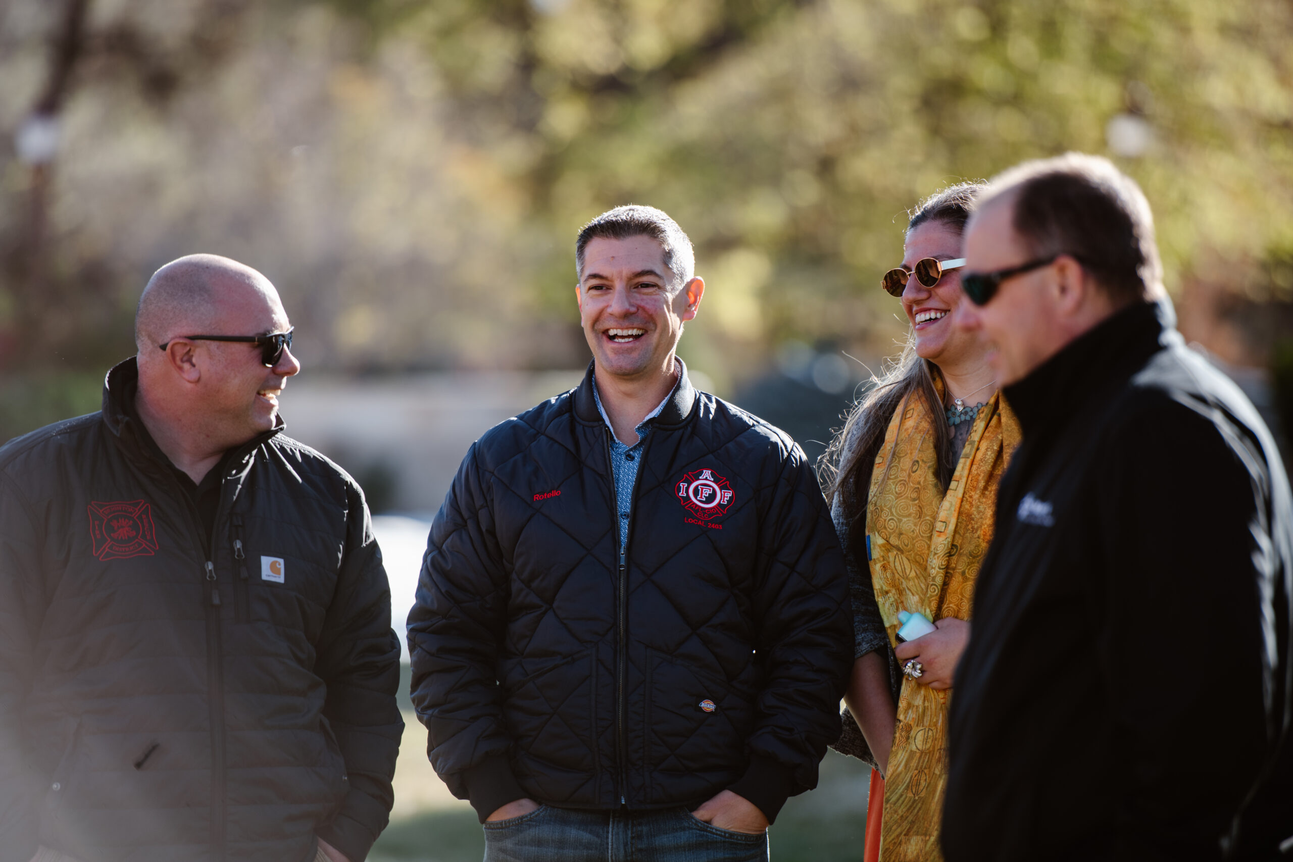 PSLD participants laugh together outside at DU